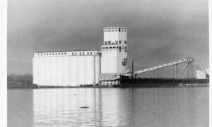 black and white port and elevator in background