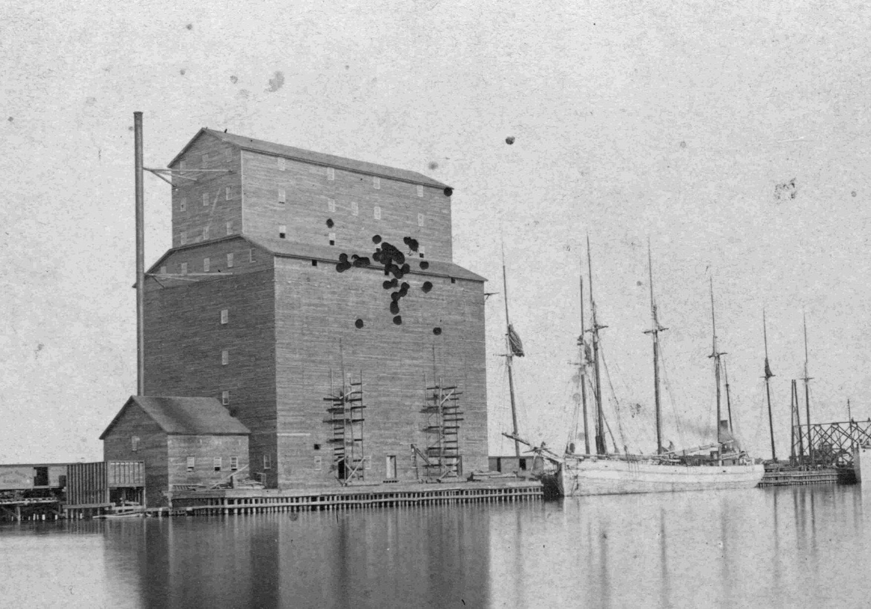 black and white image of elevator and dock