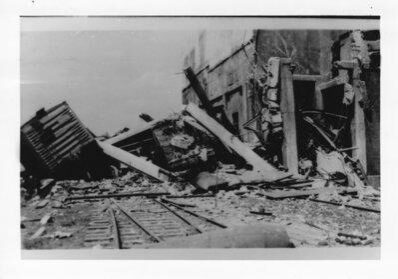 black and white photo of the track shed after pool explosion
