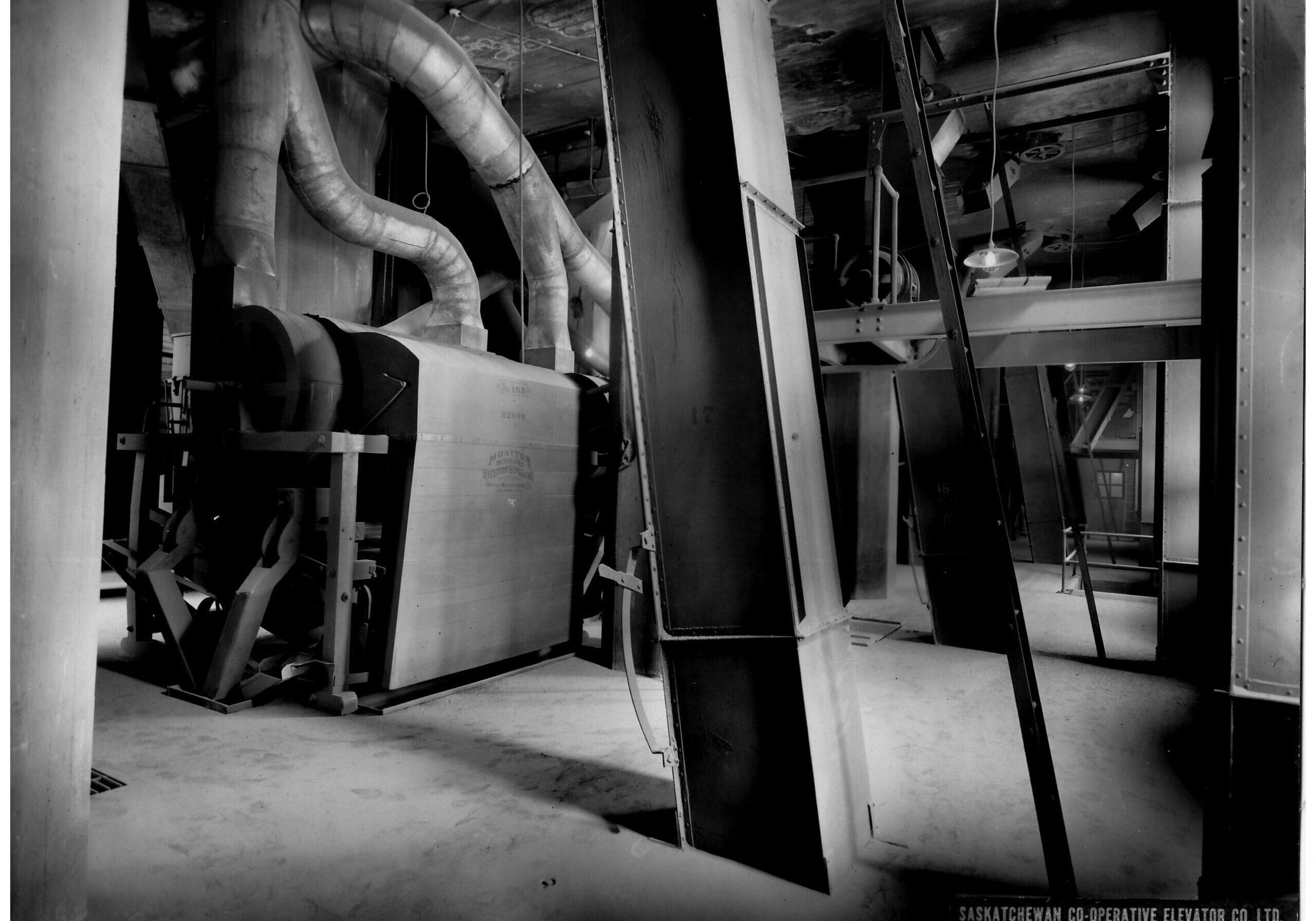 black and white image of the inside of the elevator - first floor with cleaners