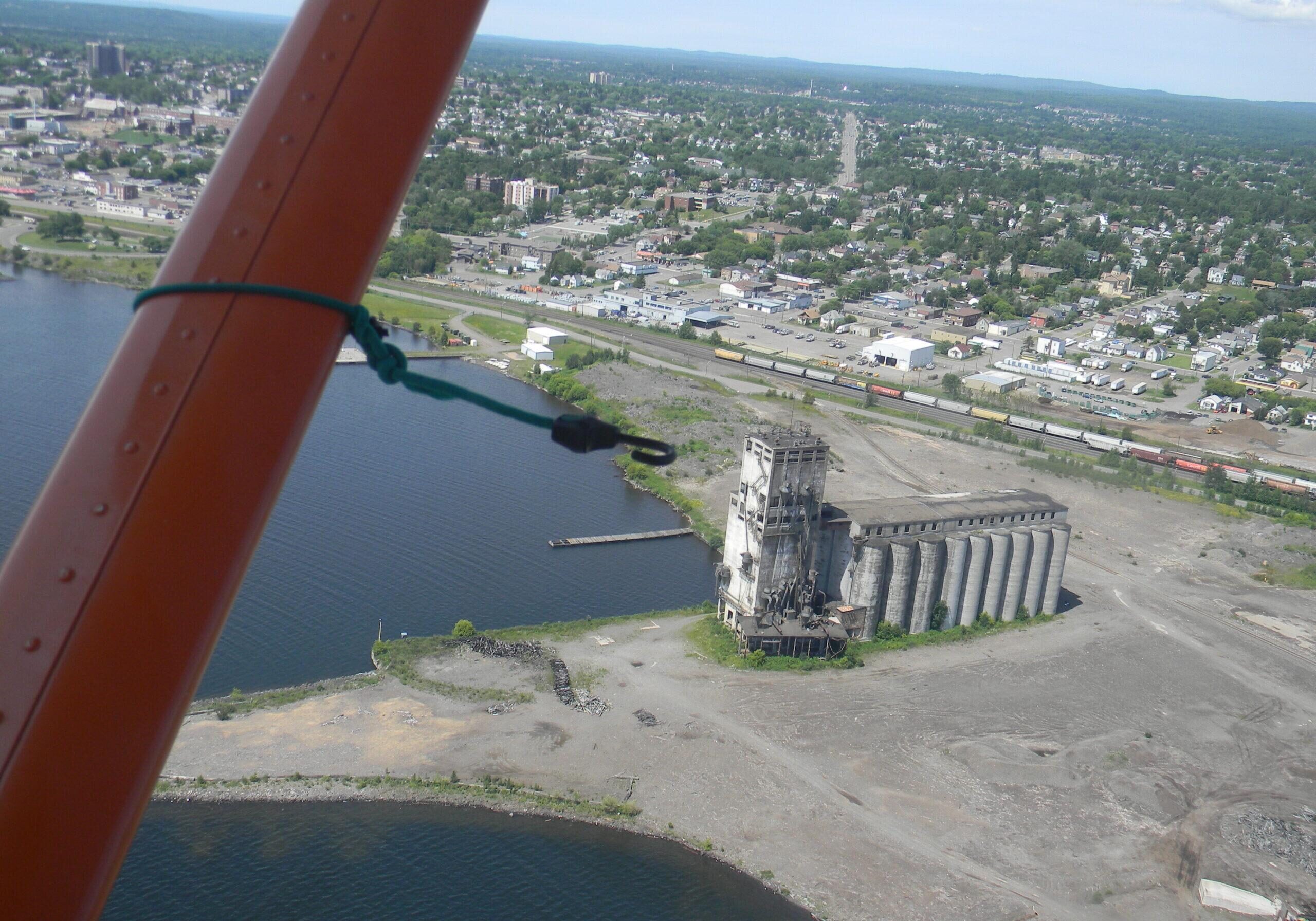birds eye view of elevator, city, and port
