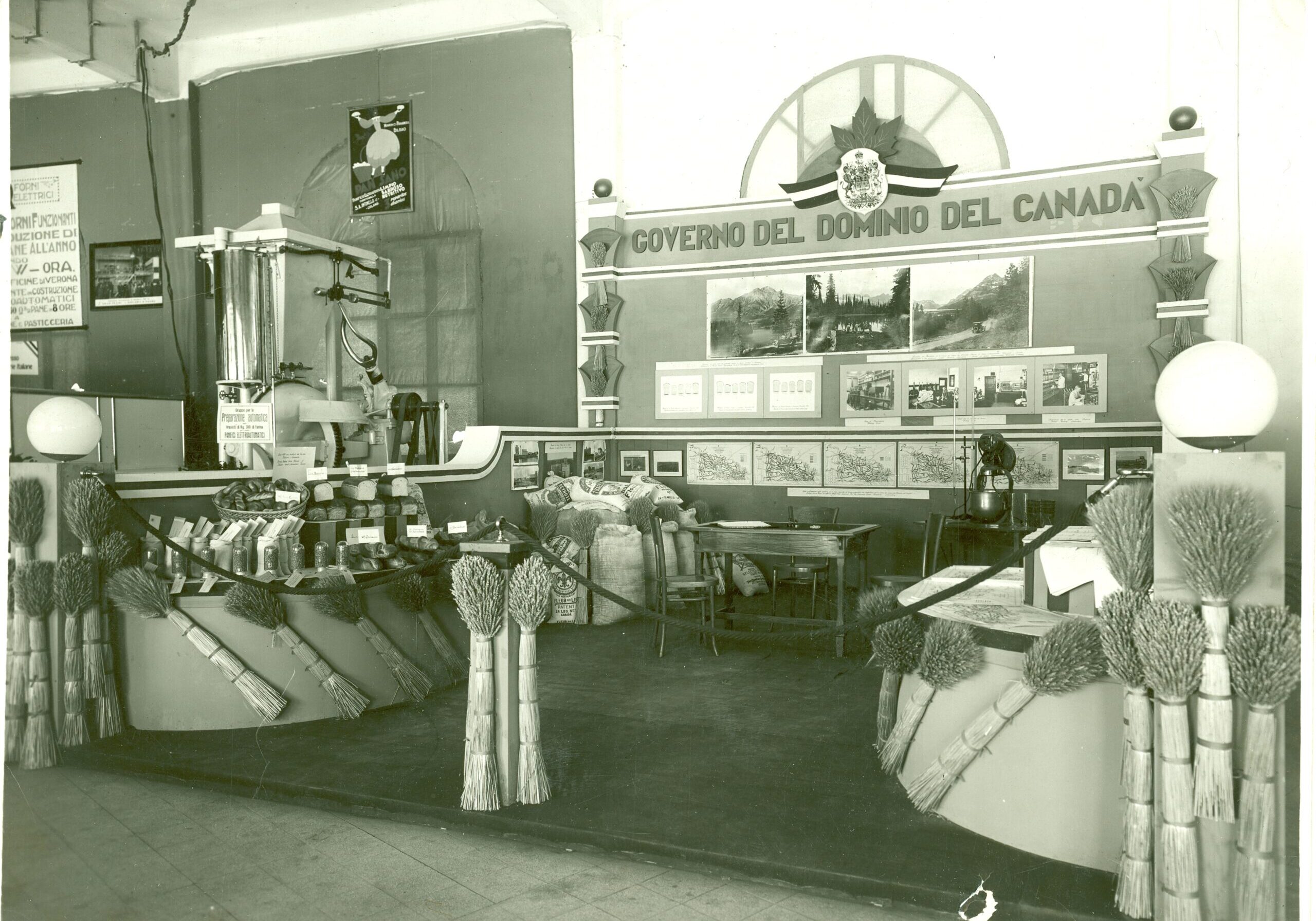 9 x 7, b &amp; w photo of the Governo Del Dominio Del Canada food products exhibit, June 15 to July 15 1932, no location given on photo but attached note indicated Bologna, Italy. Bilancio della Fiera-Exposizione