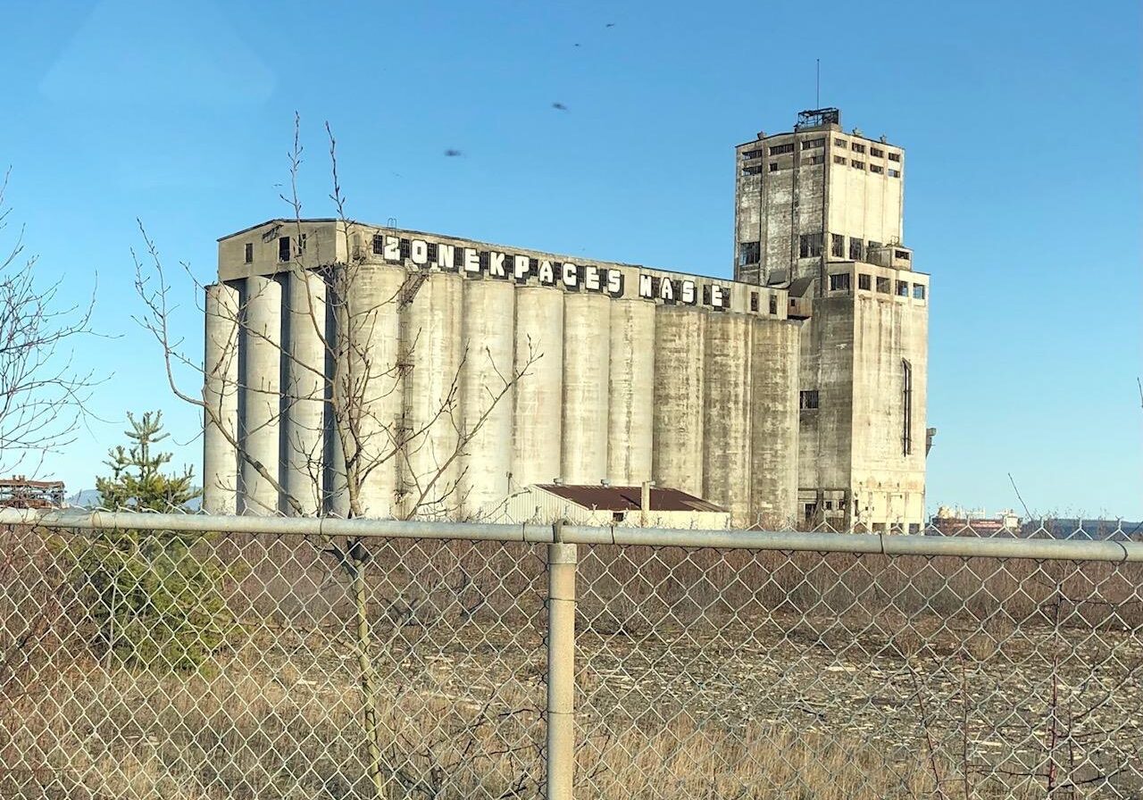 elevator behind wire fence