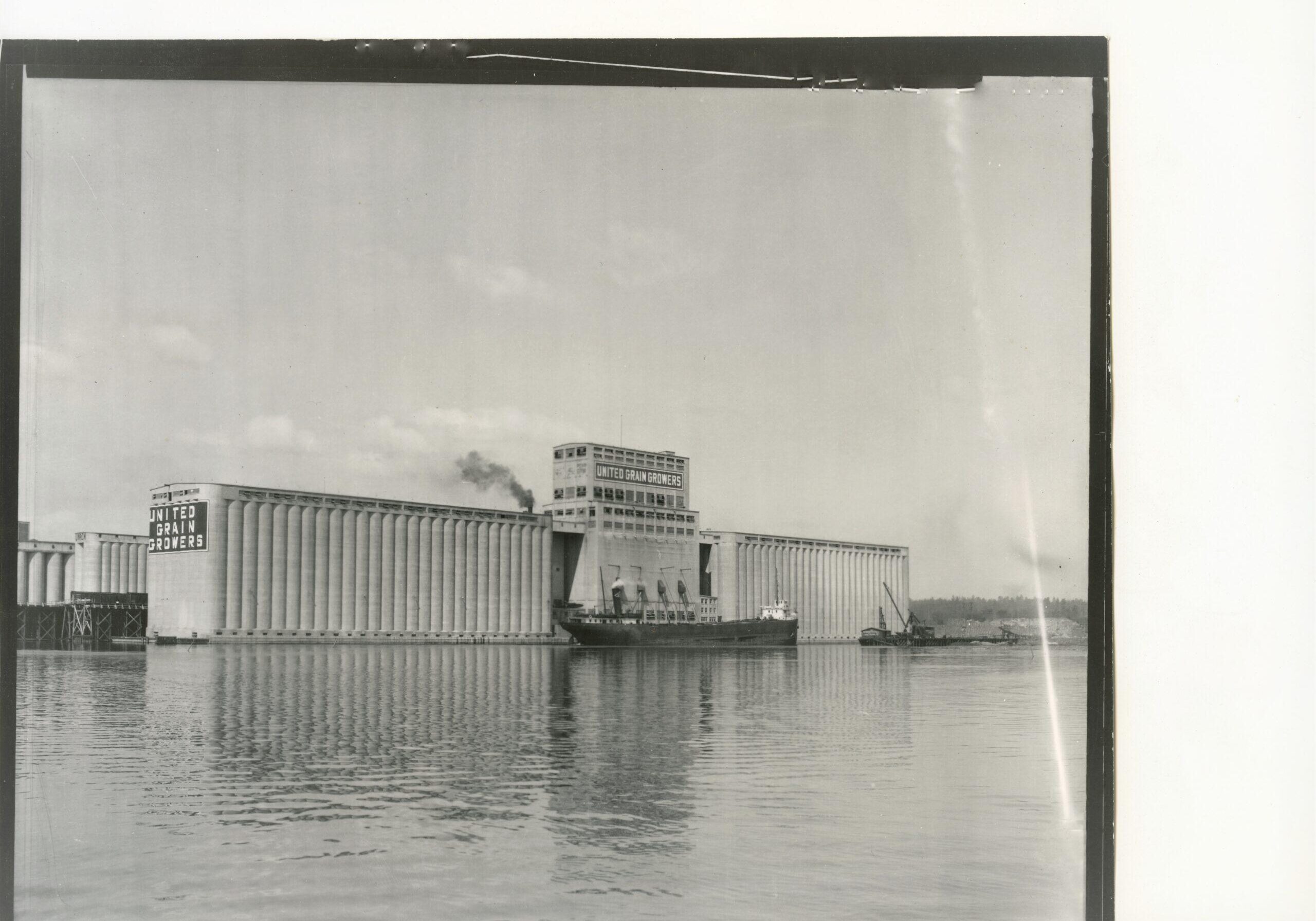 black and white image of terminal elevator on water